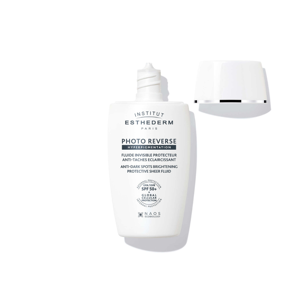 Освітлюючий сонцезахисний флюїд проти пігментних плям Institut Esthederm Photo Reverse Anti-Dark Spots Brightening Protective Sheer Fluid (New Formula SPF 50+), 40ml MC - 021526 фото